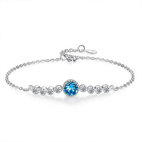 bransoletka srebrna z niebieskim kryształem
